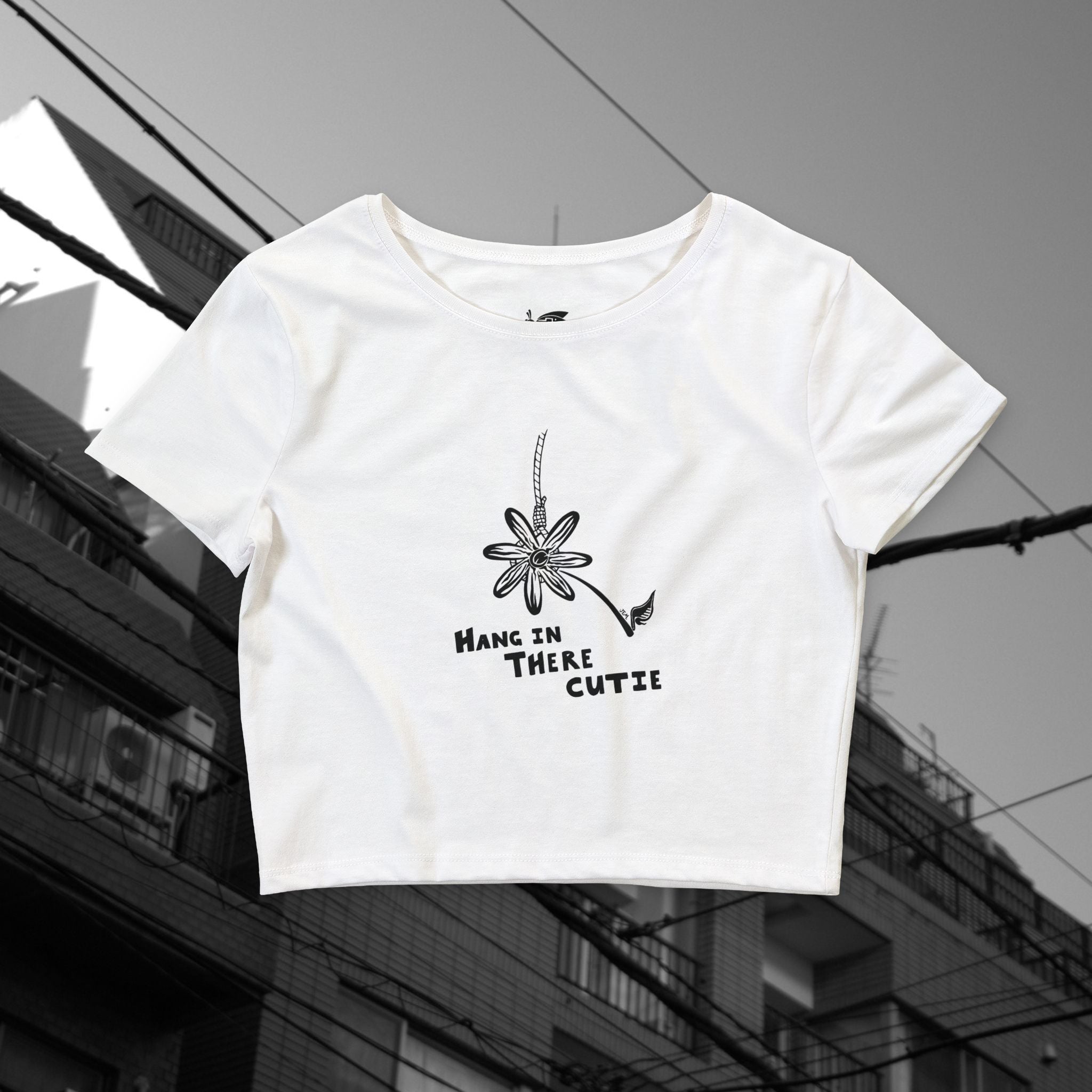 “Hang in There Cutie” Cropped tee - Daisy Graphic Women’s Crop Tee